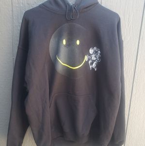 Astronaut Spray Painting a Smiley Face on the Moon Hoodie